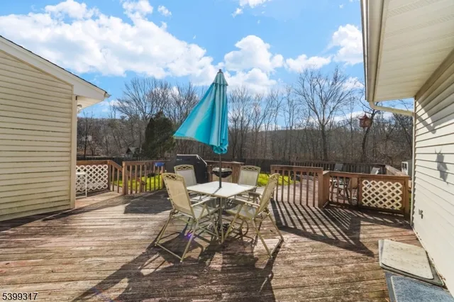 a view of a chairs and tables in the patio