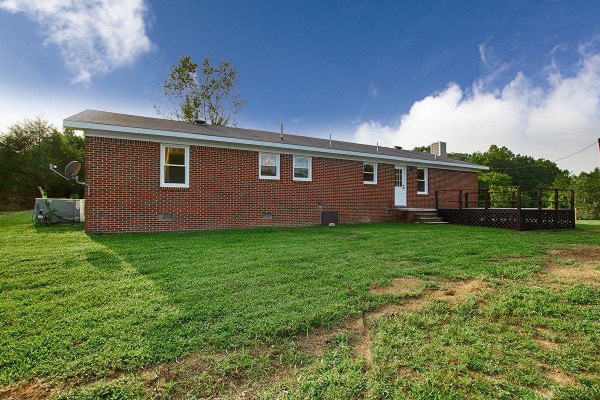 477 Holt Hollow Road Prospect, TN 38477 - Photo 22 of 34 a front view of house with yard and green space