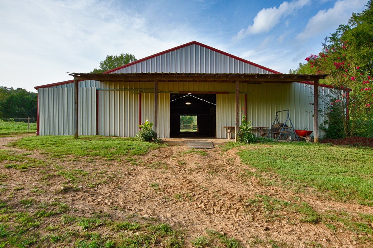 477 Holt Hollow Road Prospect, TN 38477 - Photo 31 of 34 a front view of a house with garden