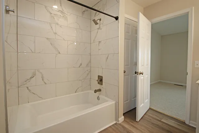 a bathroom with a bathtub