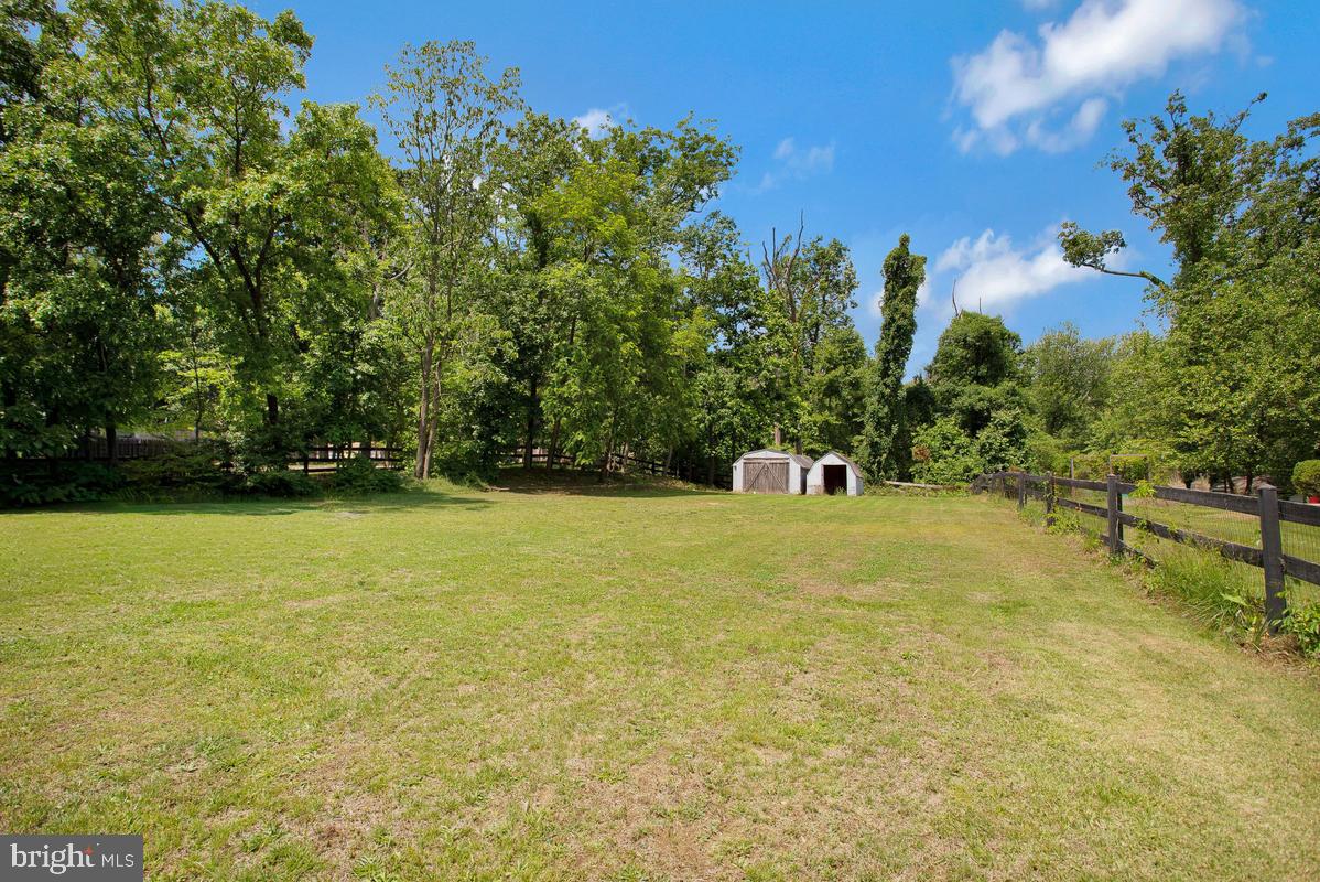 976 Shore Acres Road Arnold, MD 21012 - Photo 33 of 40 a swimming pool with trees in the background