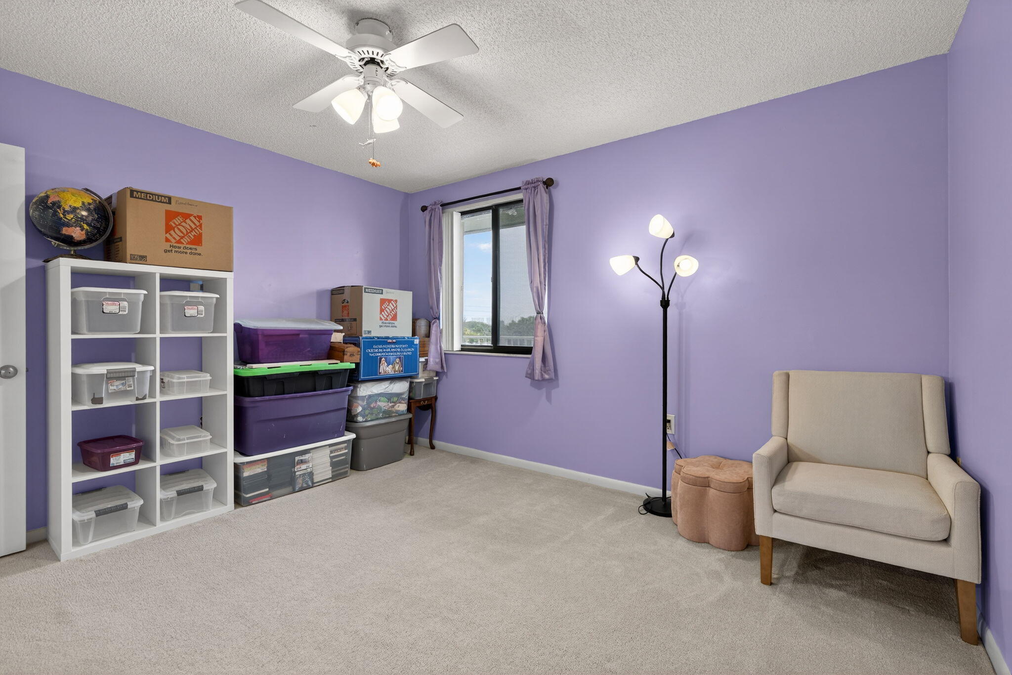 2441 Village Boulevard, Unit 405 West Palm Beach, FL 33409 - Photo 15 of 24 a room with furniture and window