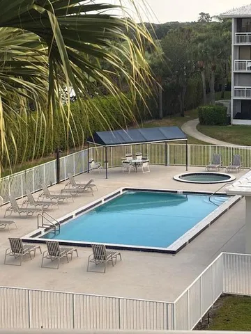 a view of outdoor space and swimming pool