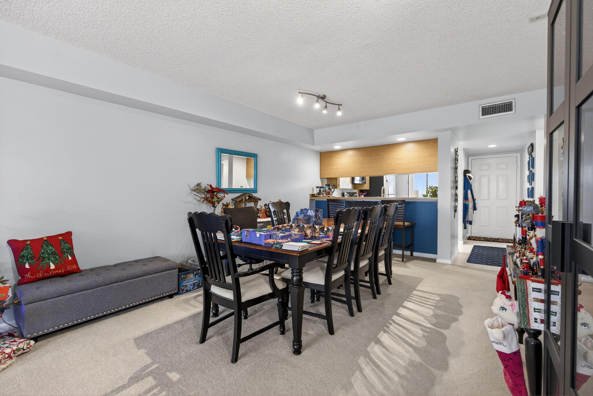 2441 Village Boulevard, Unit 405 West Palm Beach, FL 33409 - Photo 7 of 24 a view of a dining room with furniture and a livingroom