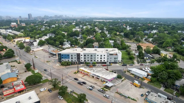 an aerial view of a city with lots of residential buildings