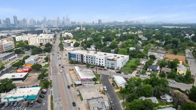 an aerial view of a city with lots of residential buildings