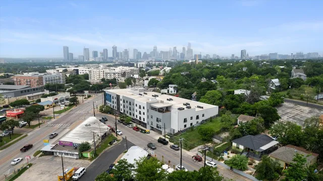 an aerial view of a city with lots of residential buildings