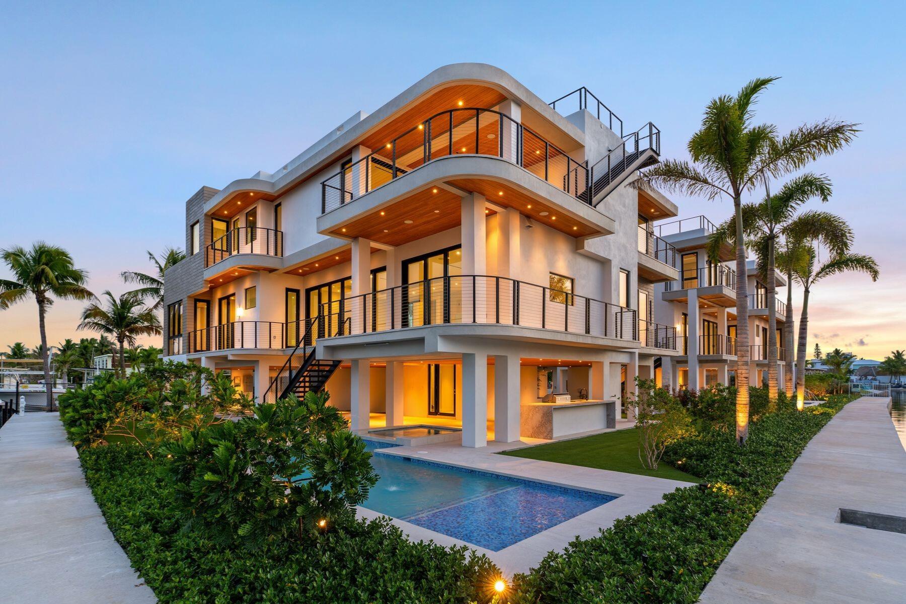 301 Buttonwood Circle, Unit B Key Largo, FL 33037 - Photo 31 of 40 a front view of a multi story residential apartment building