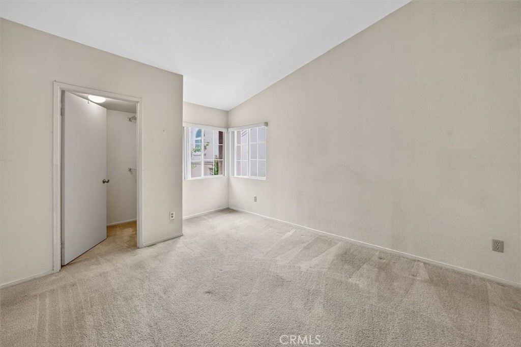 25126 Steinbeck Avenue, Unit D Stevenson Ranch, CA 91381 - Photo 11 of 22 a view of an empty room