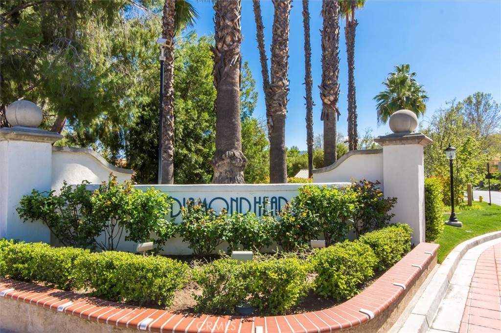 25126 Steinbeck Avenue, Unit D Stevenson Ranch, CA 91381 - Photo 15 of 22 a view of a garden with pathway