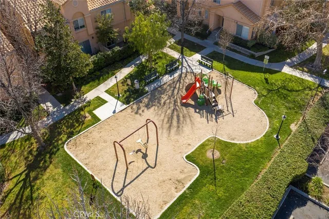 an aerial view of a house with swimming pool