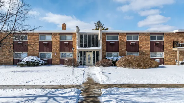 a view of a building with large windows
