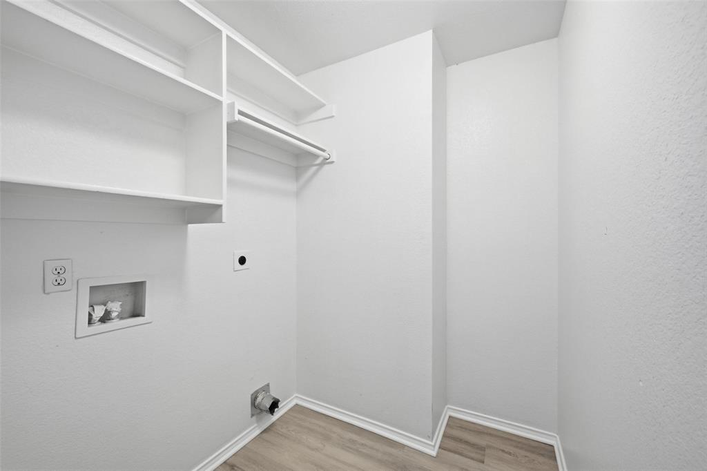 1703 Caladium Drive Corinth, TX 76210 - Photo 18 of 24 a view of an empty walk in closet