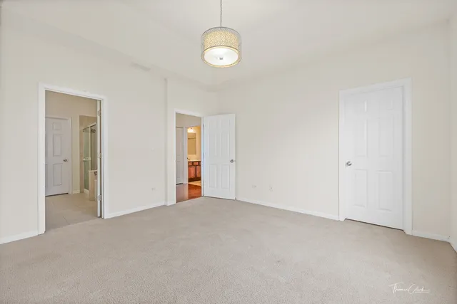 a bathroom with a sink a mirror and a shower