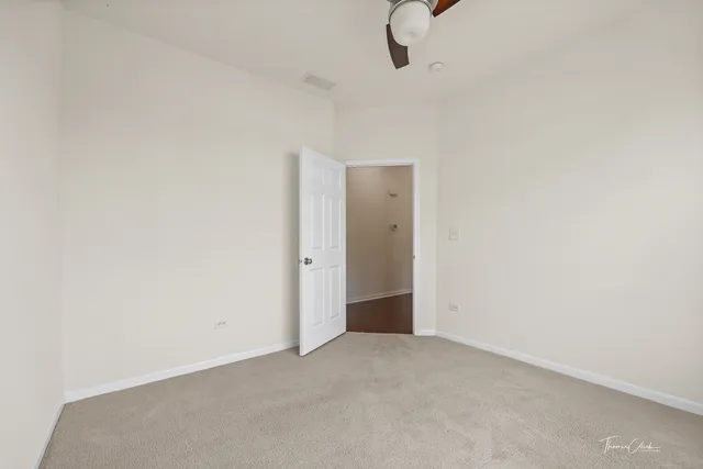 an empty room with a bathroom