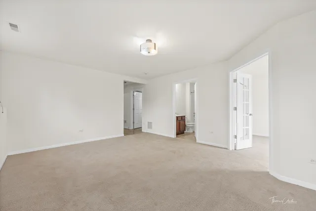 a bathroom with a sink toilet tub and shower