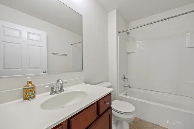 a view of a wooden fence