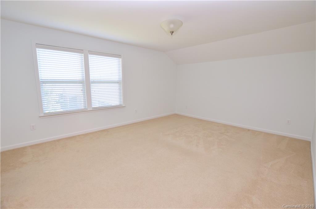 1898 Larkspur Way Tega Cay, SC 29708 - Photo 24 of 35 an empty room with a window