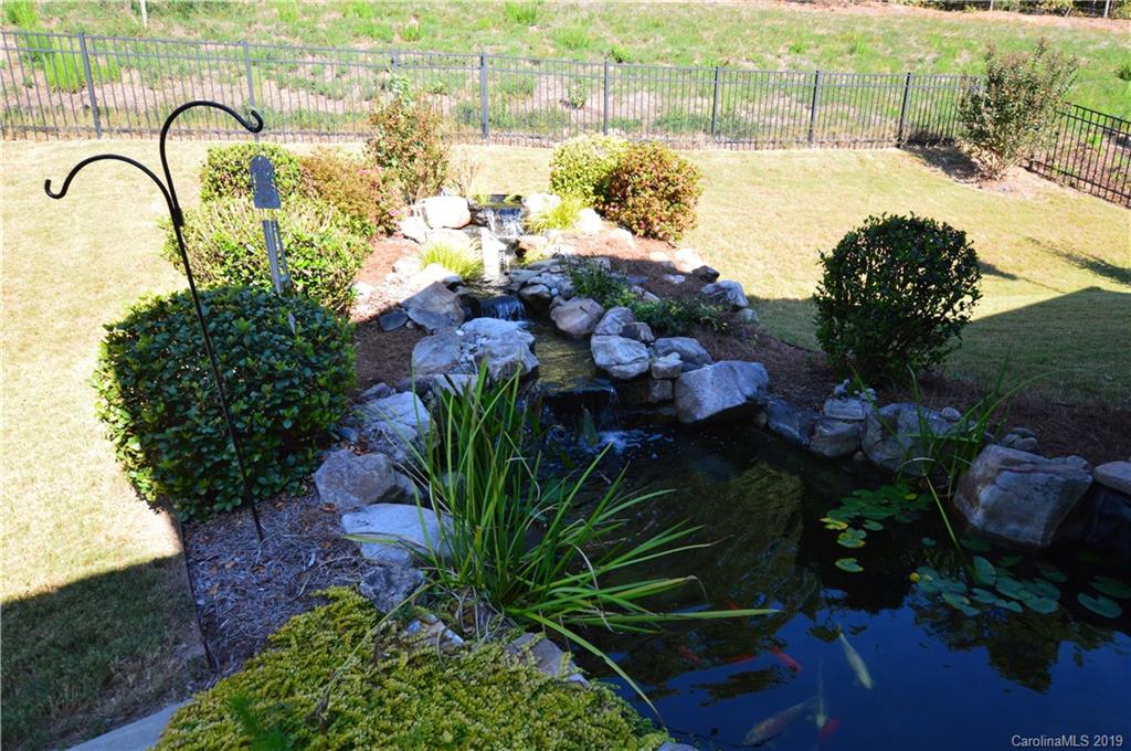 1898 Larkspur Way Tega Cay, SC 29708 - Photo 29 of 35 a view of a yard with plants