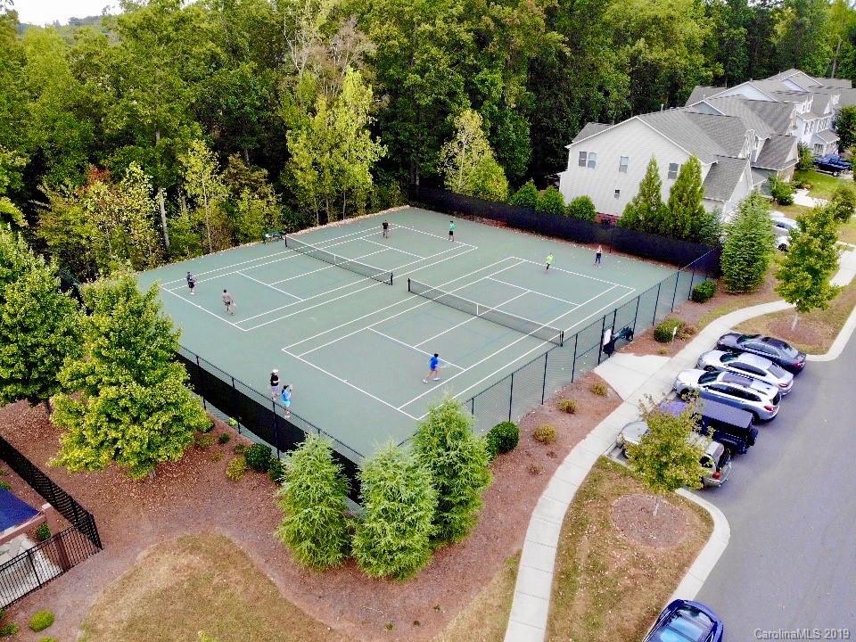 1898 Larkspur Way Tega Cay, SC 29708 - Photo 31 of 35 an aerial view of a house with a yard basket ball court and outdoor seating