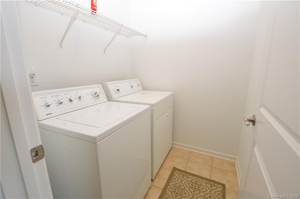 1898 Larkspur Way Tega Cay, SC 29708 - Photo 6 of 35 a utility room with dryer and washer