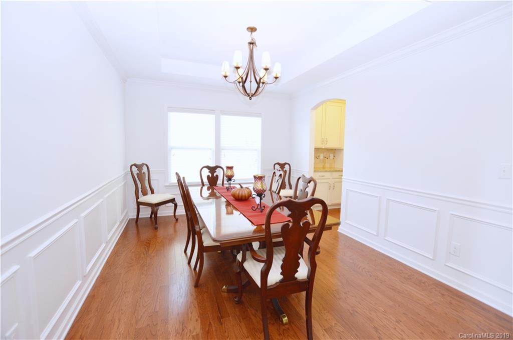 1898 Larkspur Way Tega Cay, SC 29708 - Photo 9 of 35 a view of a dining room with furniture and window