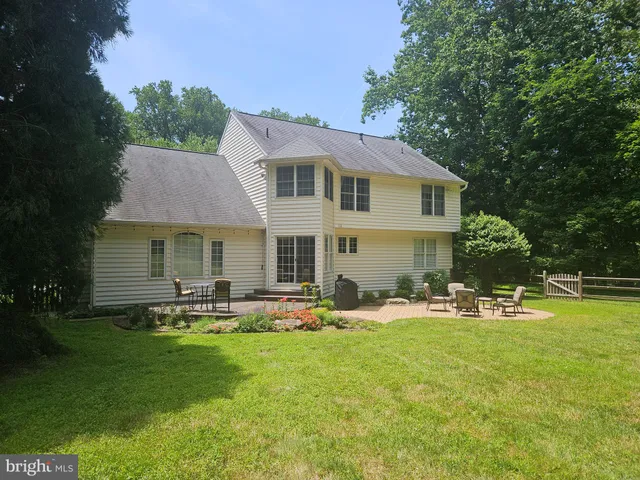 a front view of house with yard and seating area