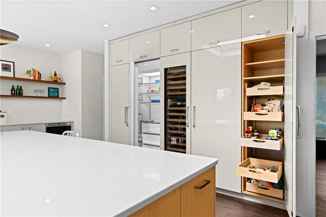 1506 Pleasant View Road Coopersburg, PA 18036 - Photo 32 of 97 An immaculate, modern kitchen with integrated appliances, showcasing a well-appointed pantry.