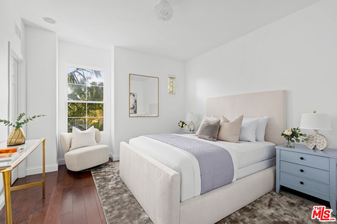 2 Arborwood Irvine, CA 92620 - Photo 16 of 26 a bedroom with a bed and a couch