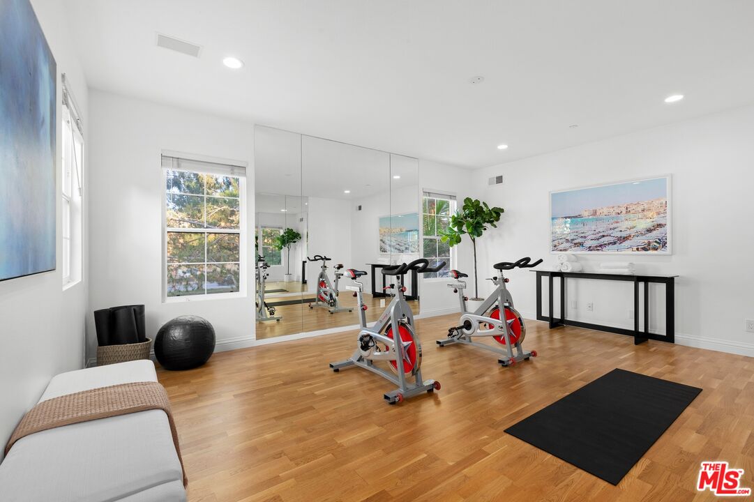 2 Arborwood Irvine, CA 92620 - Photo 17 of 26 a living room with furniture and flat screen tv