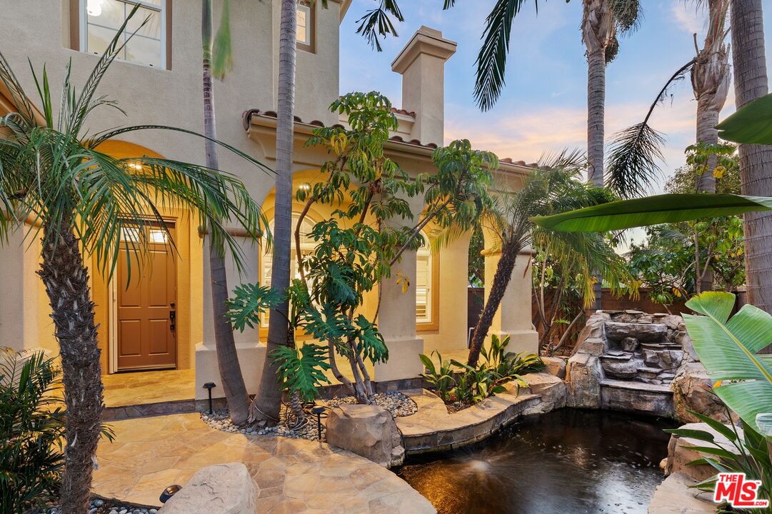 2 Arborwood Irvine, CA 92620 - Photo 2 of 26 a view of backyard of a house with swimming pool and outdoor seating