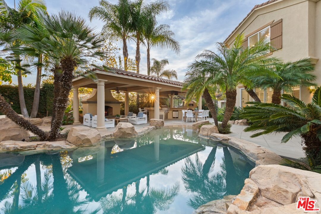 2 Arborwood Irvine, CA 92620 - Photo 21 of 26 a view of a house with pool and chairs