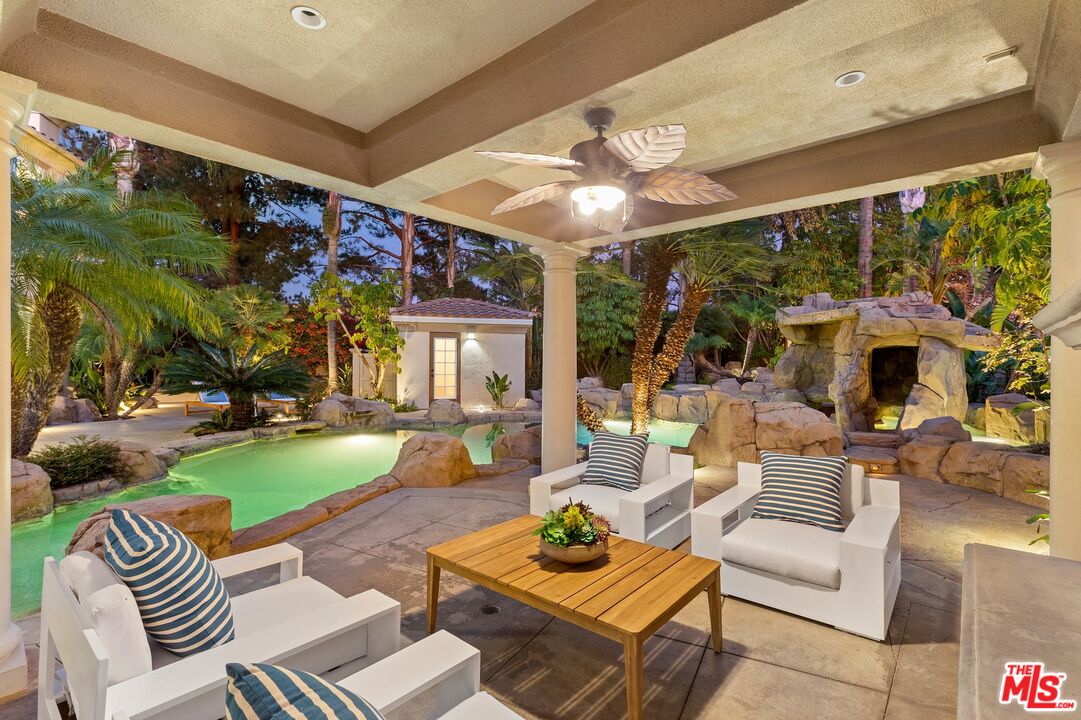 2 Arborwood Irvine, CA 92620 - Photo 24 of 26 a outdoor living space with furniture and a garden