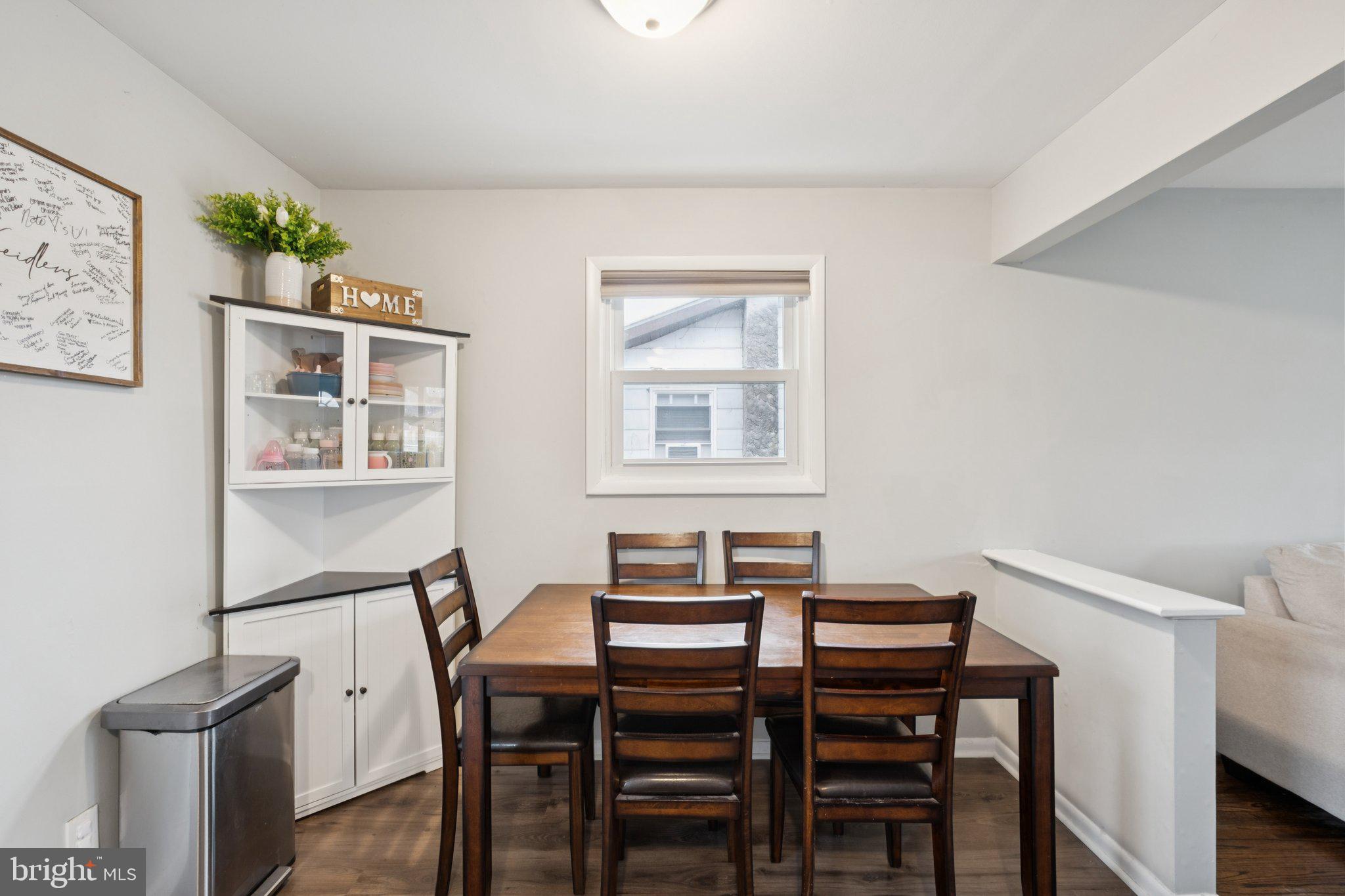 614 Brooke Avenue Magnolia, NJ 08049 - Photo 11 of 33 a view of a dining room with furniture and window