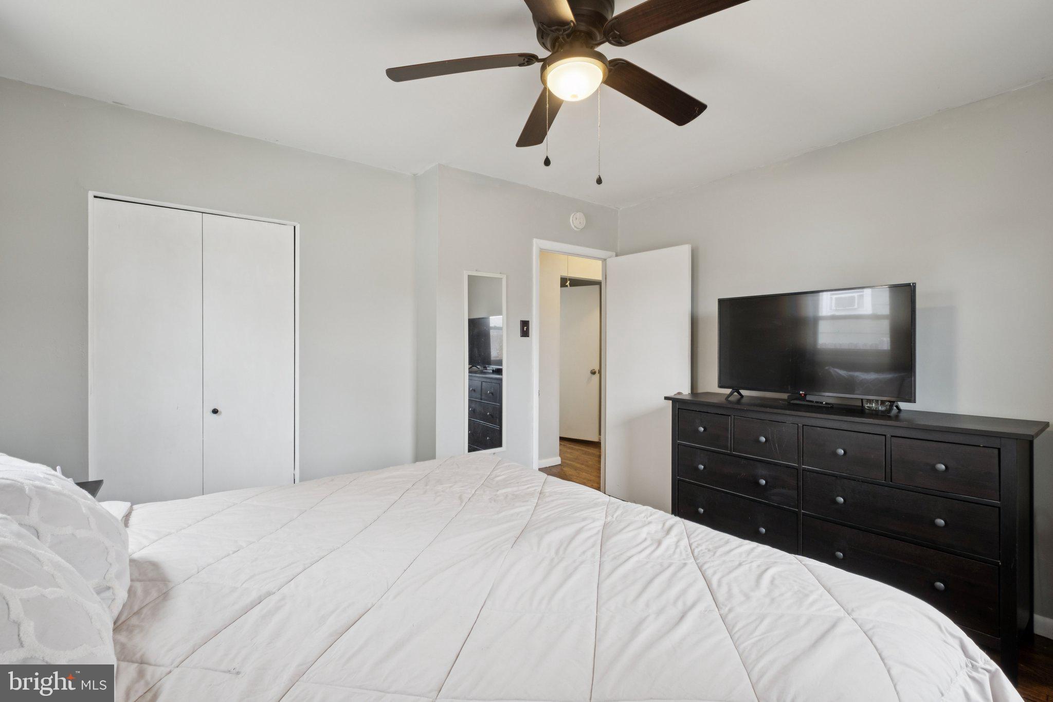 614 Brooke Avenue Magnolia, NJ 08049 - Photo 18 of 33 a bedroom with a bed and a flat screen tv