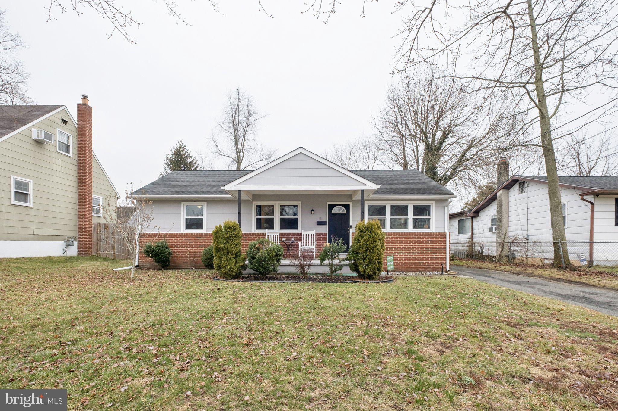 614 Brooke Avenue Magnolia, NJ 08049 - Photo 2 of 33 a front view of a house with garden