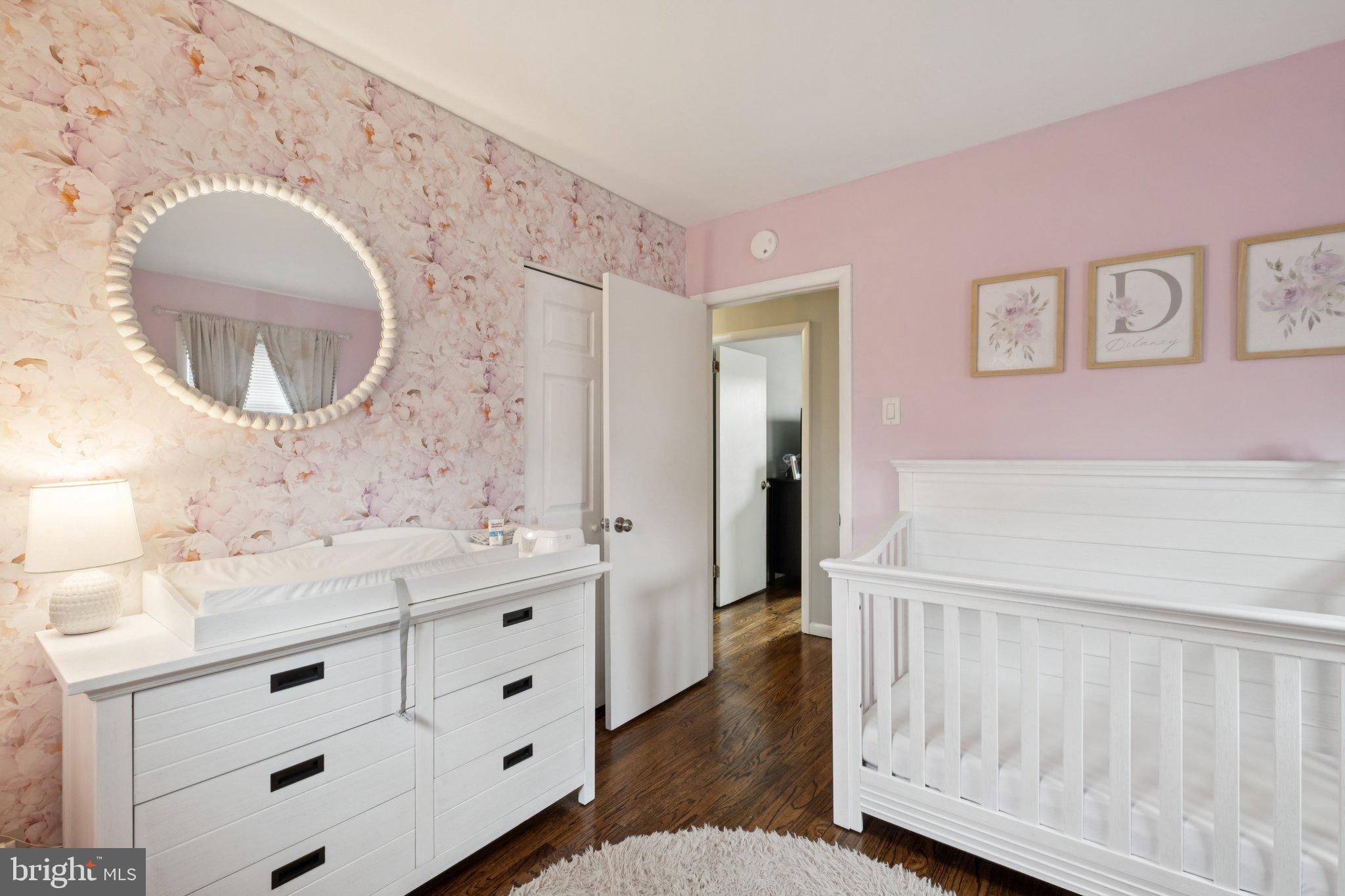 614 Brooke Avenue Magnolia, NJ 08049 - Photo 23 of 33 a bathroom with a sink mirror and vanity