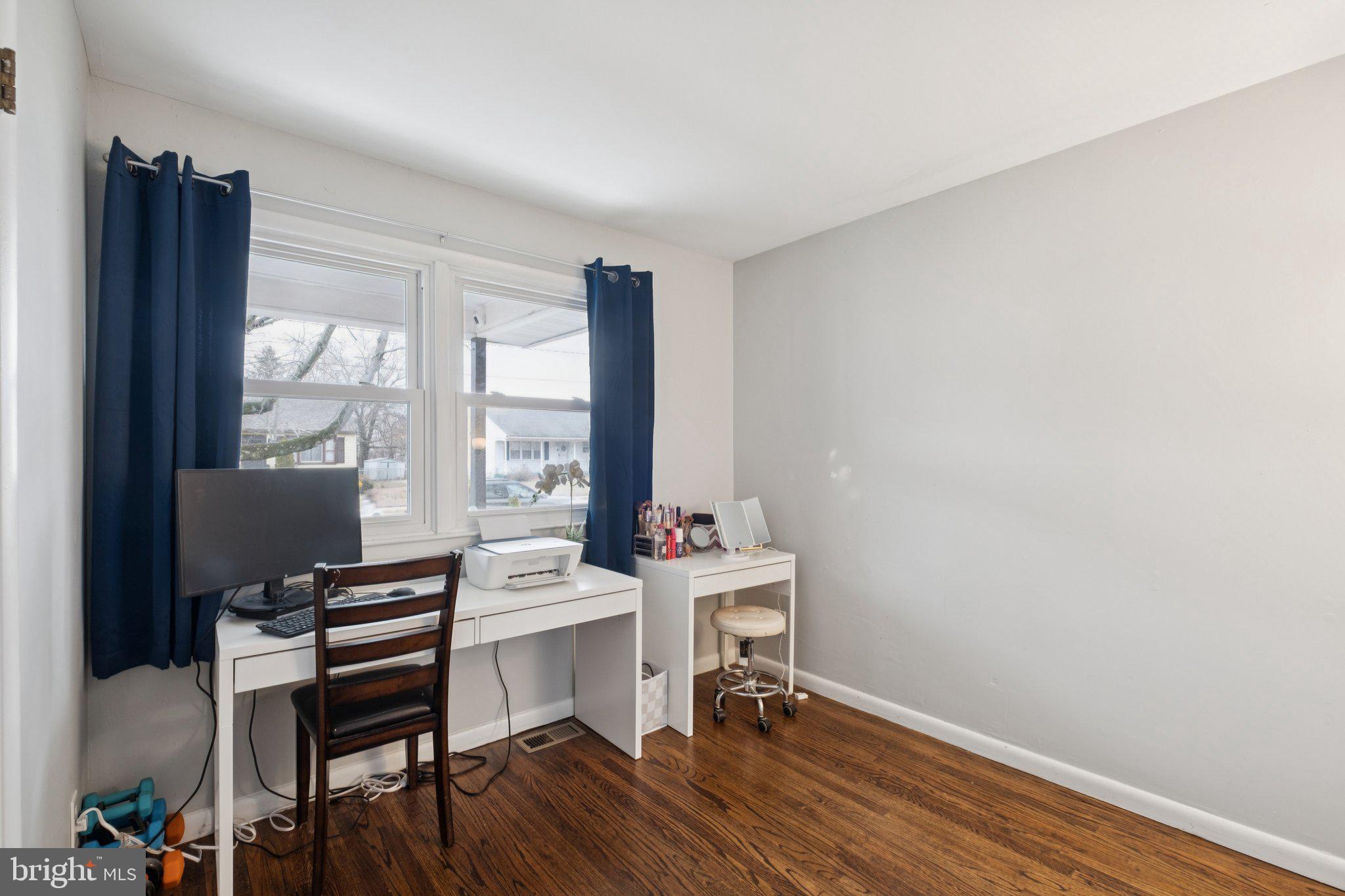 614 Brooke Avenue Magnolia, NJ 08049 - Photo 24 of 33 a view of a workspace with furniture and a window