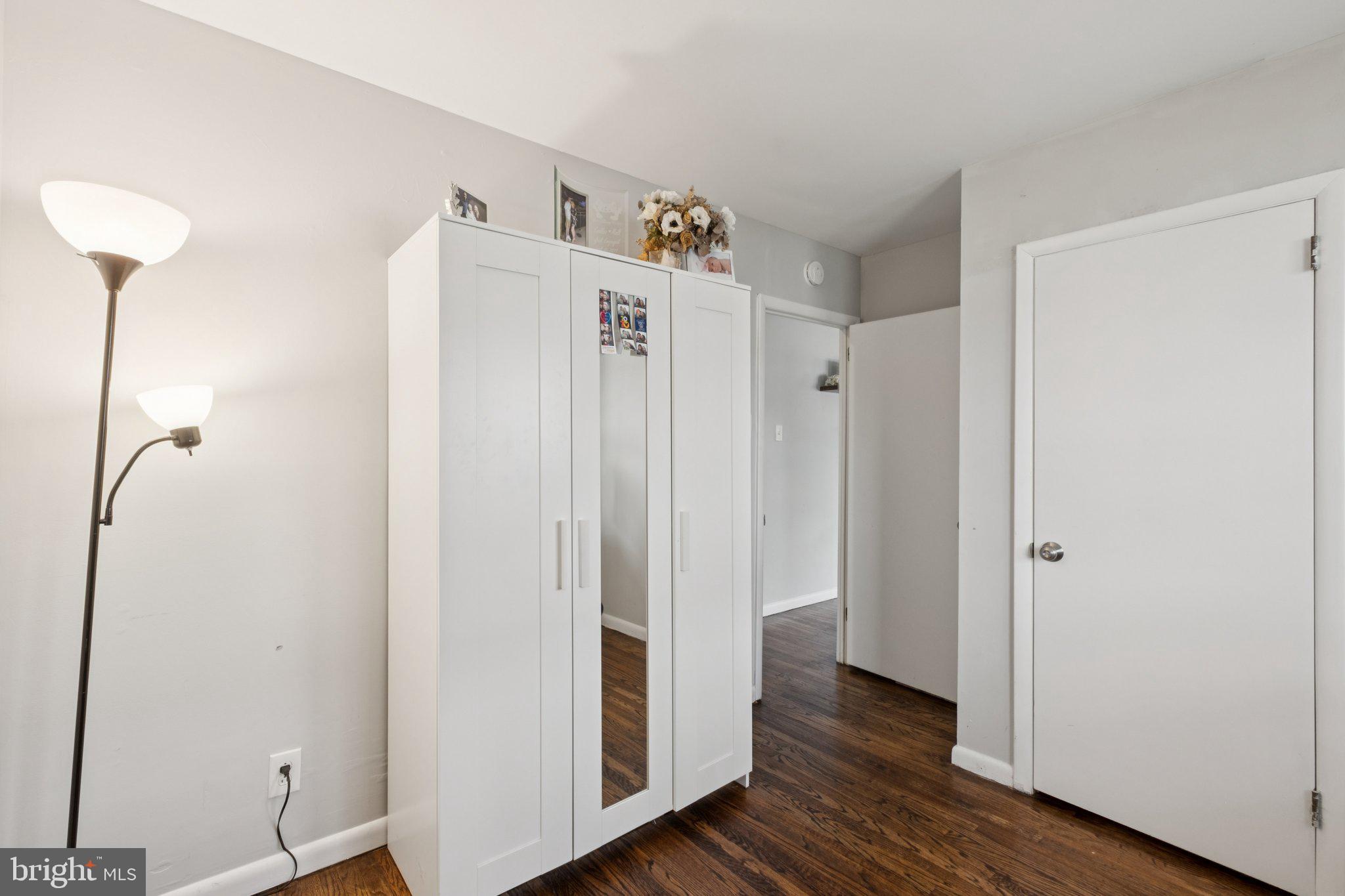 614 Brooke Avenue Magnolia, NJ 08049 - Photo 26 of 33 a view of a hallway with wooden floor