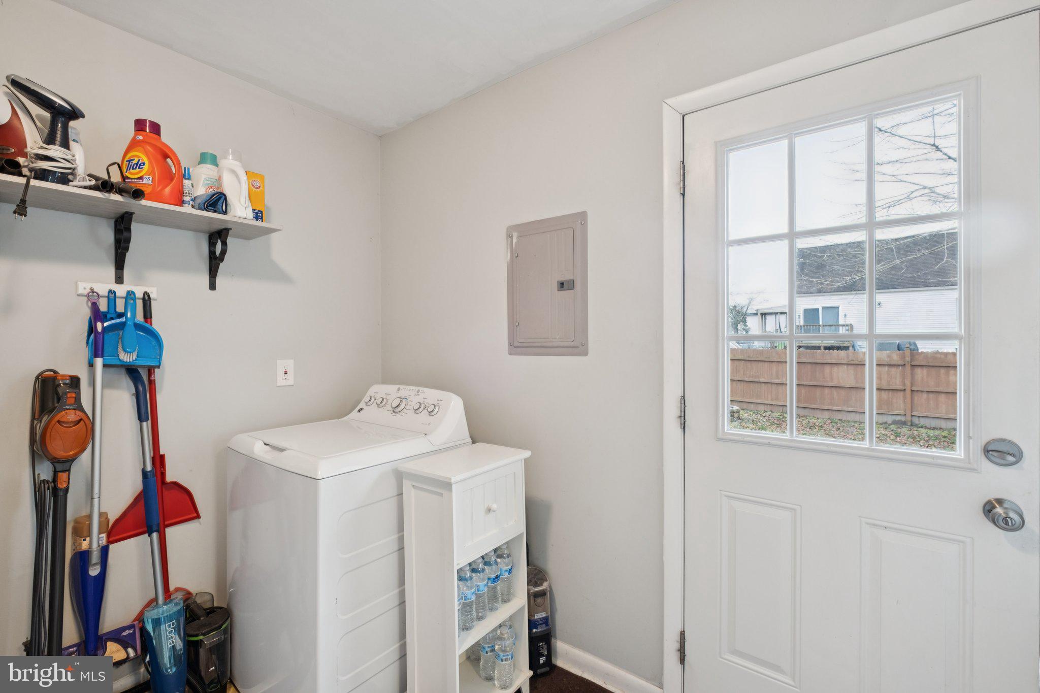 614 Brooke Avenue Magnolia, NJ 08049 - Photo 27 of 33 a storage room with washer and dryer
