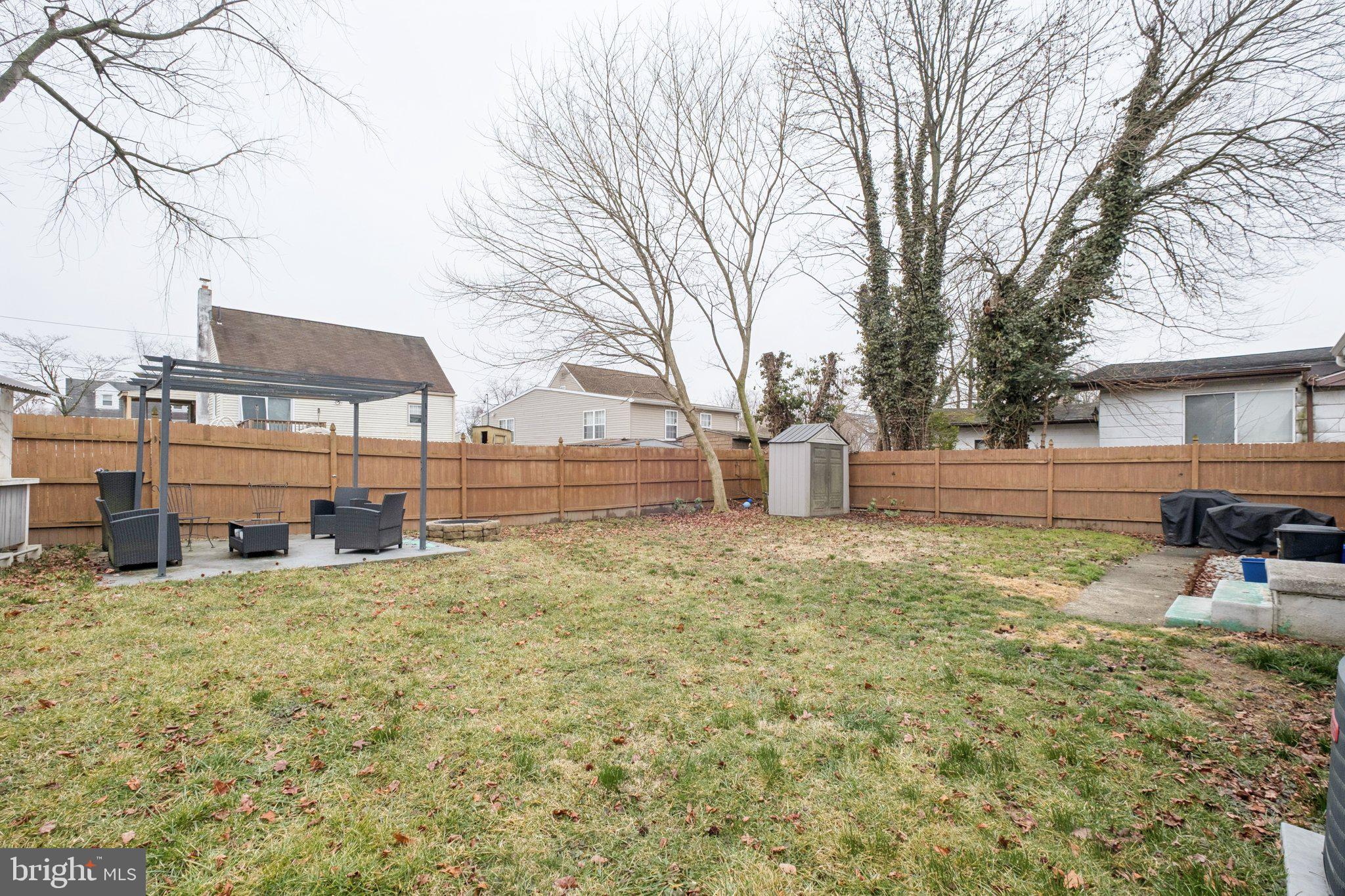 614 Brooke Avenue Magnolia, NJ 08049 - Photo 30 of 33 a view of a yard with table and chairs