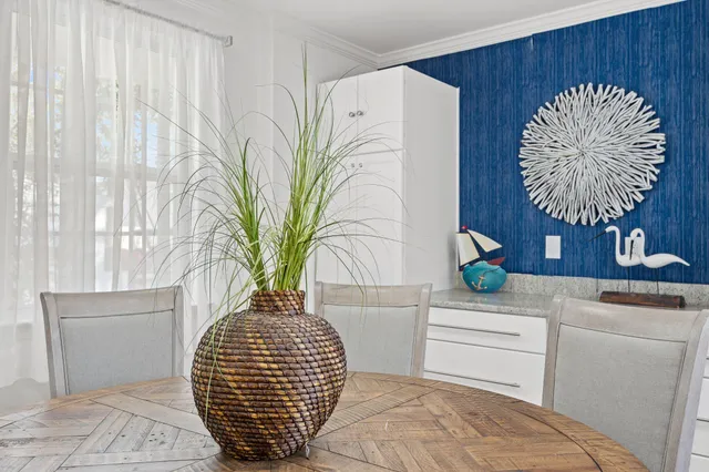 a vase of flowers sitting on a table