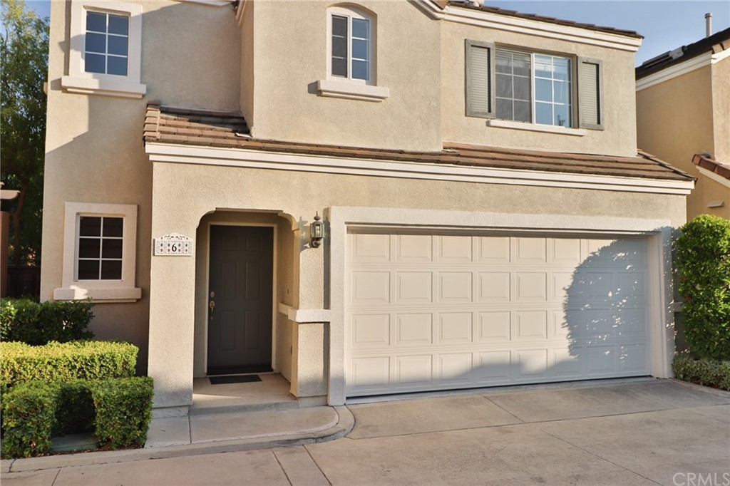 6 Rue Monet Lake Forest, CA 92610 - Photo 2 of 24 Another photo of the front showing the covered entry.