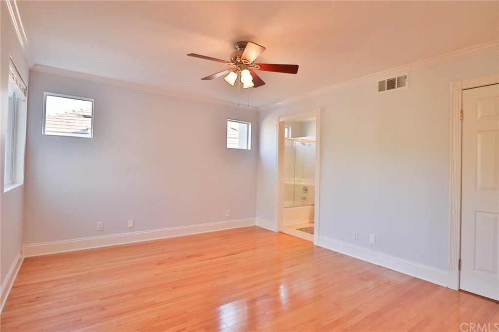 6 Rue Monet Lake Forest, CA 92610 - Photo 12 of 24 The master suite showing the ceiling fan, entry to the master bath and the door to the right leads to a walk-in closet