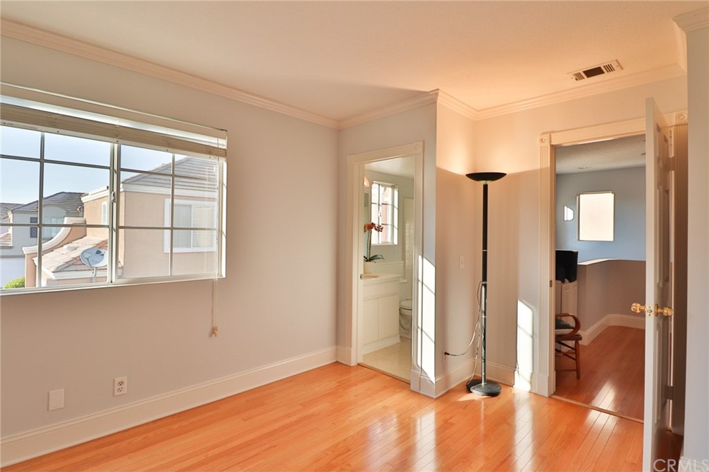 6 Rue Monet Lake Forest, CA 92610 - Photo 20 of 24 The secondary bedroom/suite showing the entry and also the entry to the attached bath.
