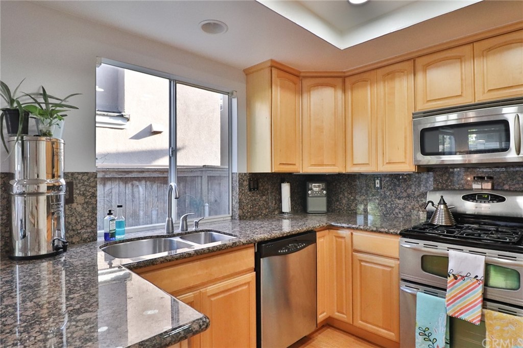 6 Rue Monet Lake Forest, CA 92610 - Photo 5 of 24 The kitchen sink with view of the back patio.