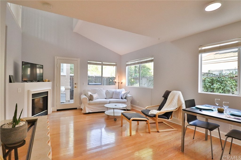 6 Rue Monet Lake Forest, CA 92610 - Photo 9 of 24 The dining room and living room toward the fireplace and French door to the patio.
