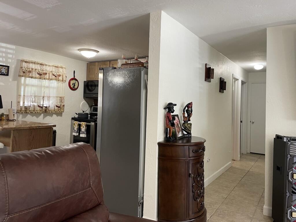 664 Colson Drive Key Largo, FL 33037 - Photo 11 of 36 a living room with furniture and a window