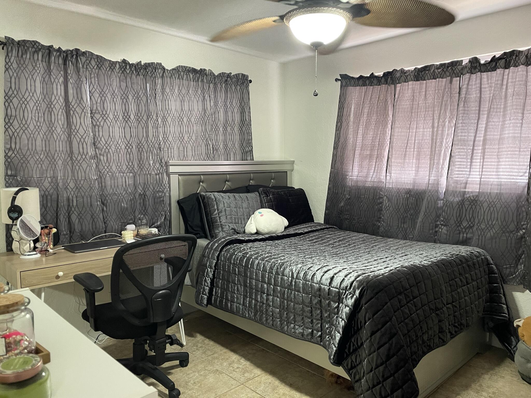 664 Colson Drive Key Largo, FL 33037 - Photo 15 of 36 a bedroom with a bed and a dresser