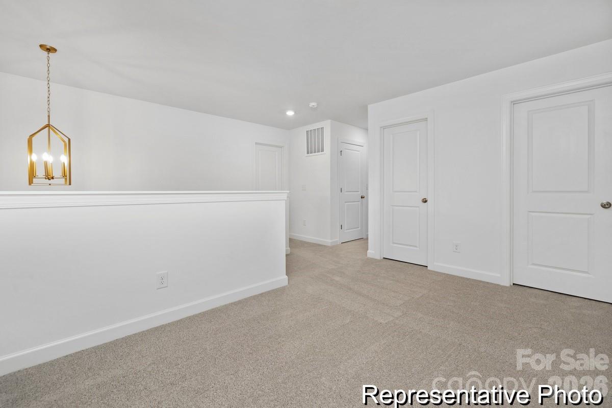 155 Soft Breeze Bend, Unit 286B Locust, NC 28097 - Photo 15 of 28 a view of an empty room